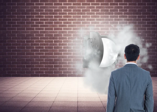 Composite image of businessman standing — Stock Photo, Image