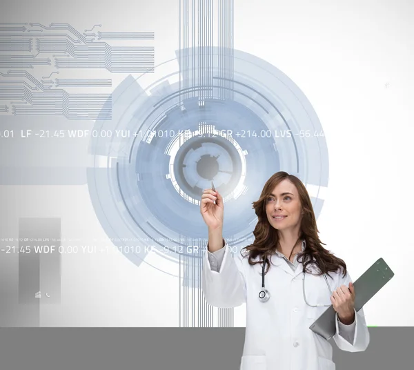 Smiling doctor pointing — Stock Photo, Image