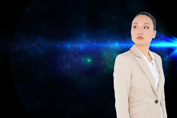 Composite image of unsmiling asian businesswoman — Stock Photo, Image