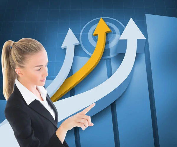 Composite image of businesswoman pointing somewhere — Stock Photo, Image