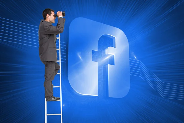 Composite image of businessman standing on ladder — Stock Photo, Image