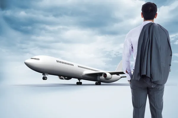 Composite image of businessman standing — Stock Photo, Image