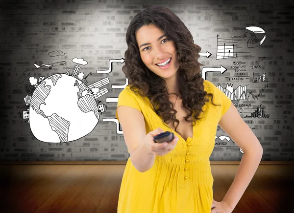 Woman changing channel with remote — Stock Photo, Image