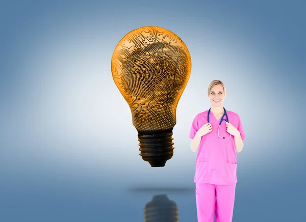 Young female surgeon holding a stethoscope — Stock Photo, Image