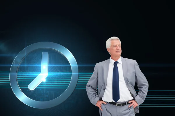 Man in a suit with his hands on his hips — Stock Photo, Image