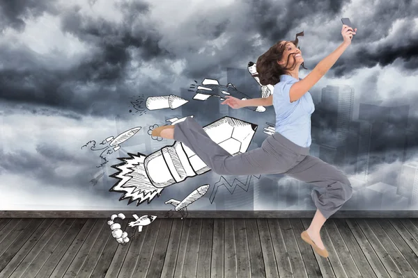 Composite image of happy classy businesswoman jumping — Stock Photo, Image