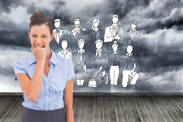 Composite image of furious businesswoman looking at the camera — Stock Photo, Image