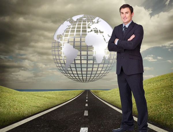 Businessman standing cross-armed — Stock Photo, Image