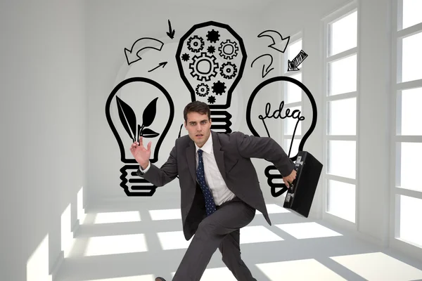 Samengestelde afbeelding van achtersteven zakenman in een hury — Stockfoto
