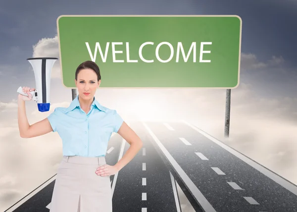 Classy businesswoman holding megaphone — Stock Photo, Image