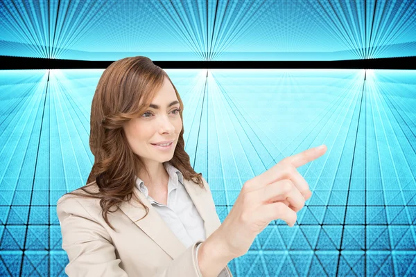 Composite image of businesswoman pressing an invisible key — Stock Photo, Image