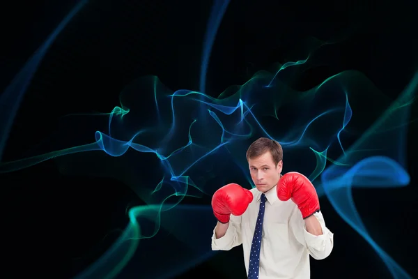 Businessman with his boxing gloves — Stock Photo, Image
