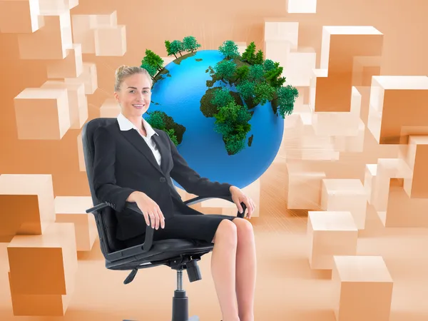 Composite image of businesswoman sitting on swivel chair in black suit — Stock Photo, Image