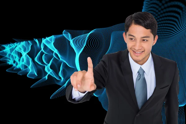 Композитный образ улыбающегося азиатского бизнесмена, указывающего — стоковое фото