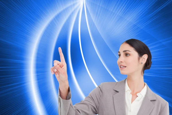 Young saleswoman operating touchscreen — Stock Photo, Image