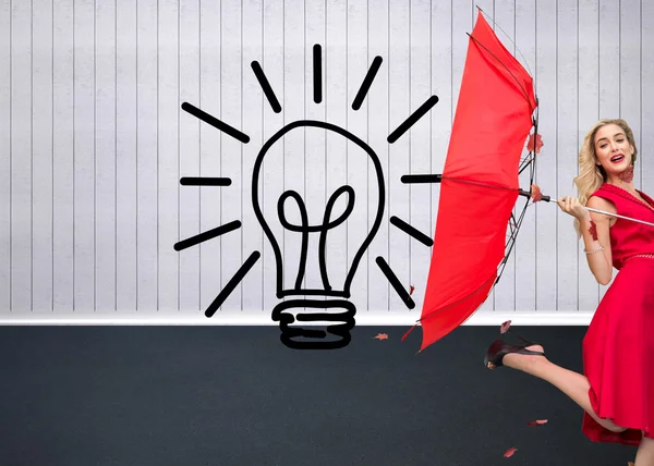 Elegant blonde holding umbrella — Stock Photo, Image