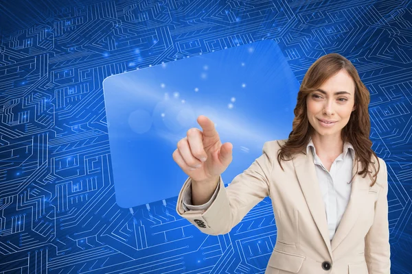 Businesswoman touching invisible screen — Stock Photo, Image