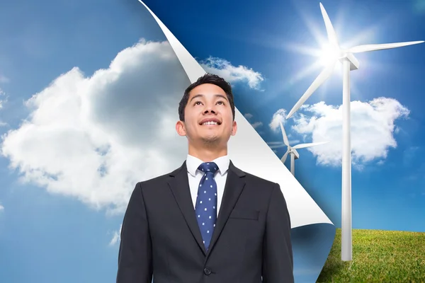 Composite image of sky background over turbine background — Stock Photo, Image