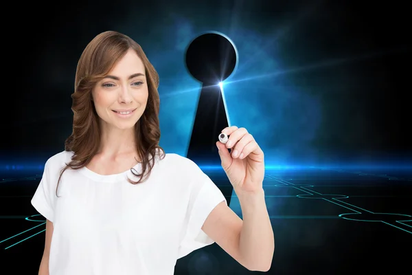 Composite image of smiling businesswoman holding marker — Stock Photo, Image