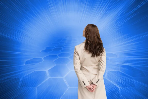 Composite image of rear view of businesswoman — Stock Photo, Image