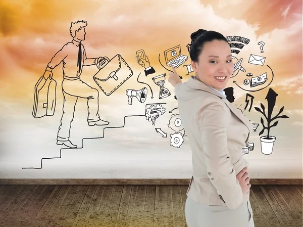 Immagine composita di donna d'affari asiatica sorridente che indica — Foto Stock