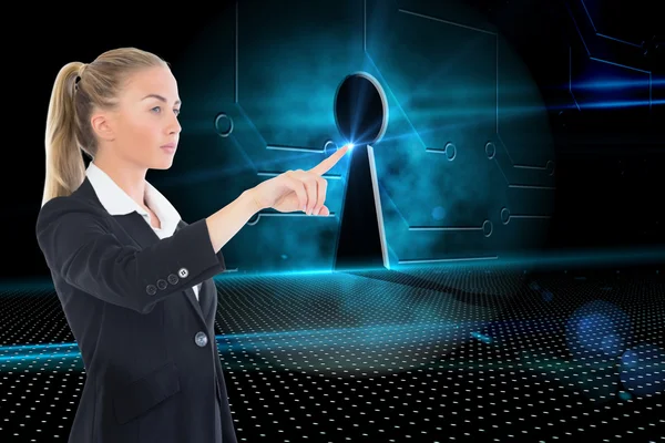 Composite image of businesswoman pointing somewhere — Stock Photo, Image