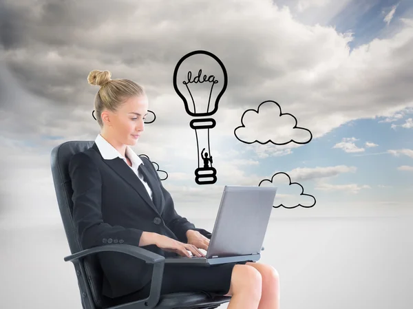 Composite image of businesswoman sitting on swivel chair with laptop — Stock Photo, Image