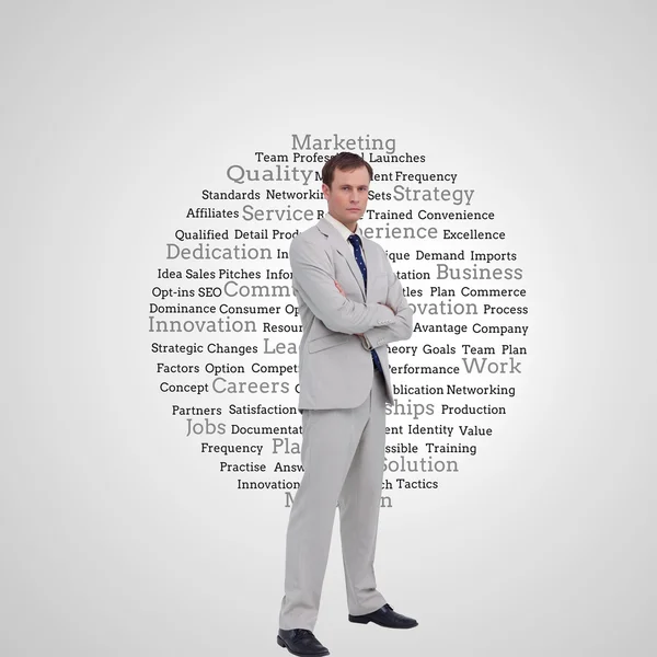 Businessman standing with his arms folded — Stock Photo, Image