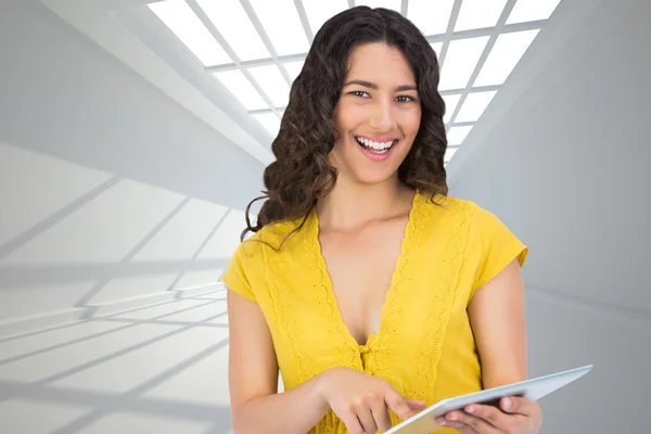 Composite image of smiling casual young woman scrolling — Stock Photo, Image