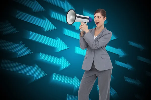 Composite image of businesswoman with loudspeaker — Stock Photo, Image