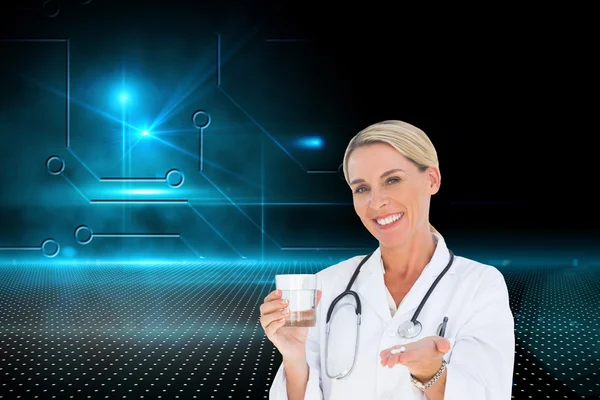Doctor holding out pills — Stock Photo, Image