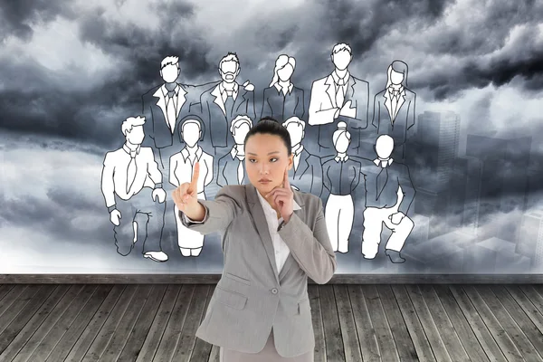 Композитный образ вдумчивой азиатской бизнесвумен указывая — стоковое фото