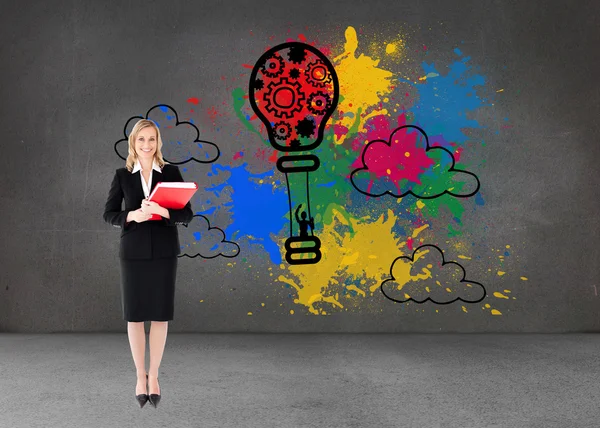 Businesswoman smiling and holding folders — Stock Photo, Image