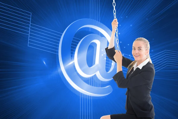 Businesswoman pulling a chain — Stock Photo, Image