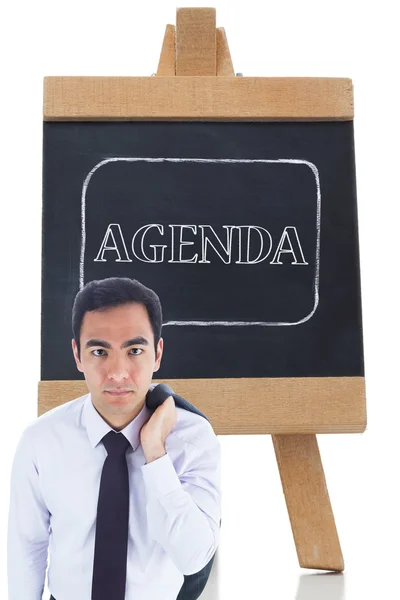 Imagen compuesta del hombre de negocios no sonriente de pie —  Fotos de Stock