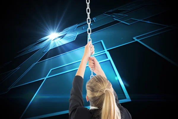 Composite image of businesswoman pulling a chain — Stock Photo, Image