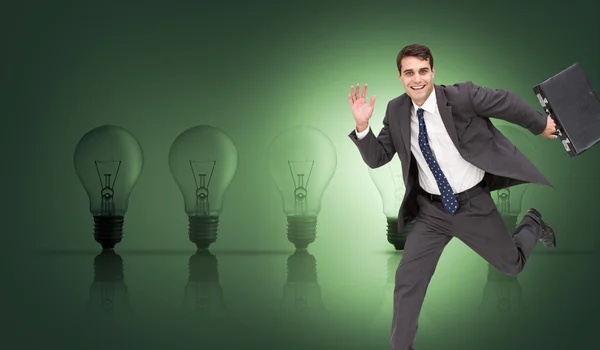 Cheerful businessman in a hury — Stock Photo, Image