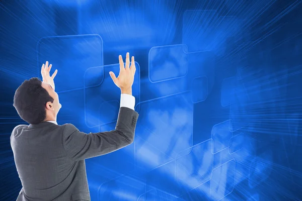 Composite image of businessman with arms raised — Stock Photo, Image