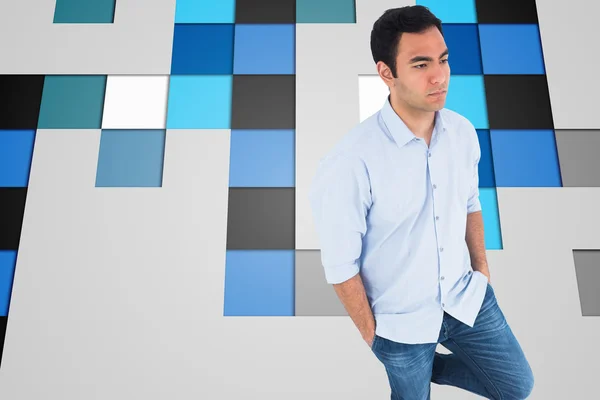 Imagen compuesta de un hombre casual no sonriente de pie —  Fotos de Stock