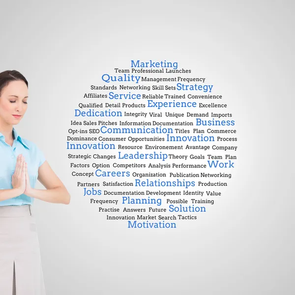 Peaceful young businesswoman praying — Stock Photo, Image