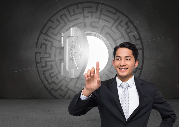Imagem composta de sorrir asiático empresário apontando — Fotografia de Stock