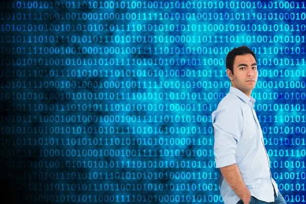 Imagen compuesta de un hombre casual no sonriente de pie — Foto de Stock