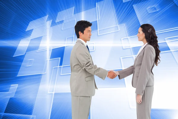 Hand shaking trading partners — Stock Photo, Image