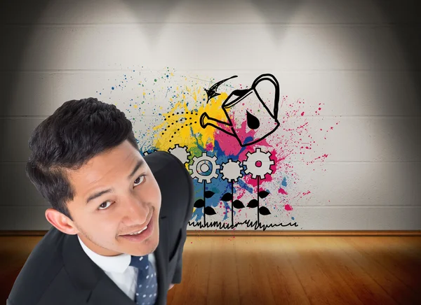 Samengestelde afbeelding van lachende Aziatische zakenman — Stockfoto