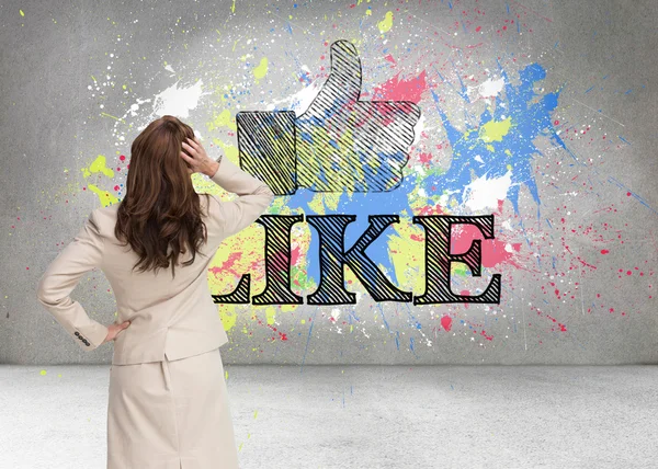 Composite image of businesswoman standing back to camera — Stock Photo, Image