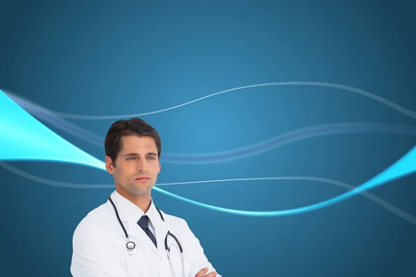 Serious doctor with arms crossed — Stock Photo, Image