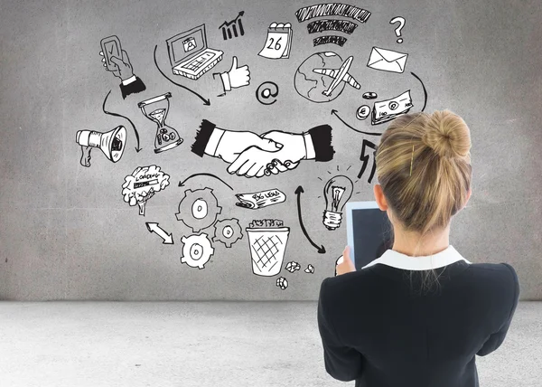 Composite image of businesswoman holding new tablet — Stock Photo, Image