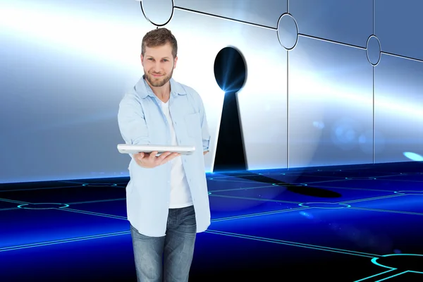 Happy man showing laptop to camera — Stock Photo, Image