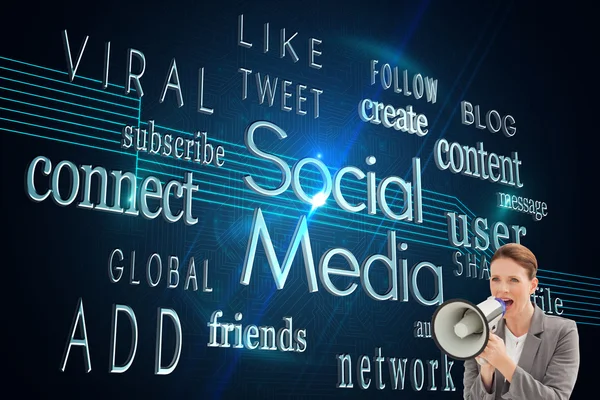 Businesswoman talking on a megaphone — Stock Photo, Image