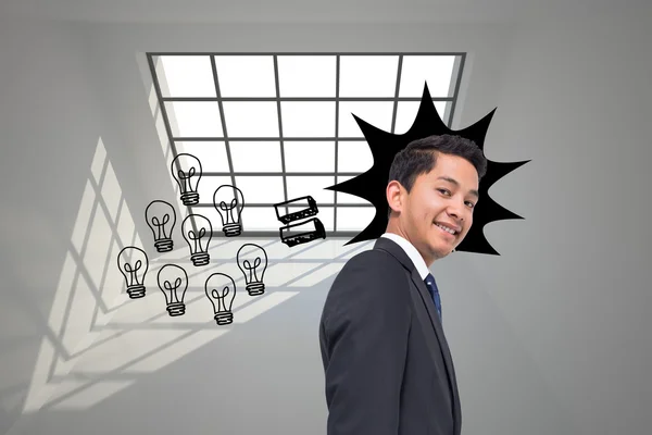 Composite image of graphic with light bulbs on grey background — Stock Photo, Image